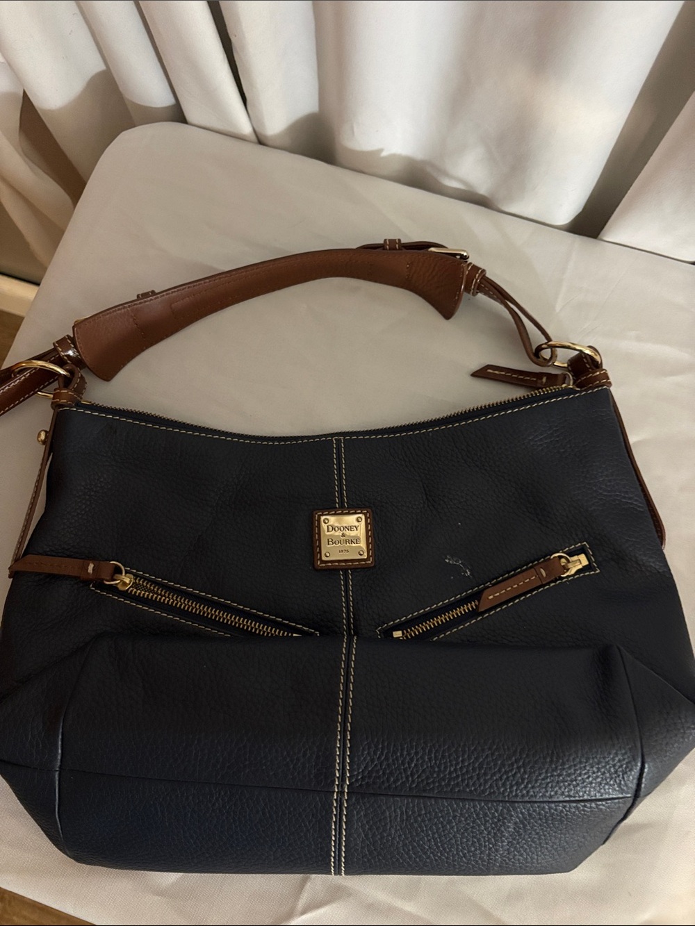 Dooney & Bourke Black Leather Shoulder Bag with Brown Trim and Gold Hardware